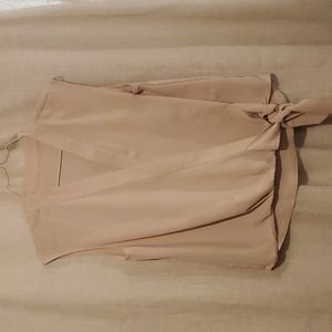 Pale pink chiffon wrap top.
